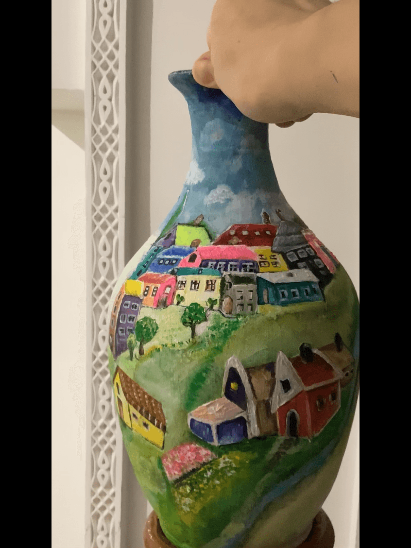 Maison coloré sur poterie